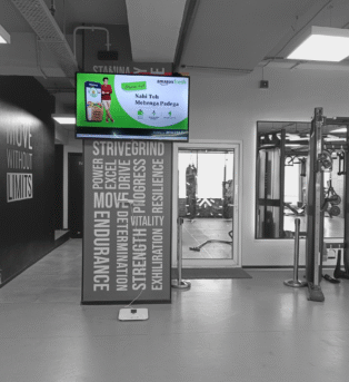 Adonmo screen on a gym floor